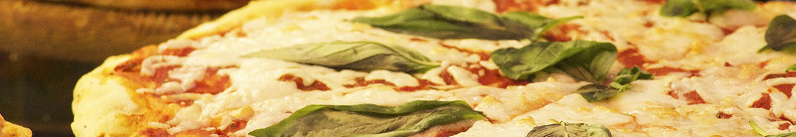 Eating Italian Pizza at Ristorante Machiavelli restaurant in Seattle, WA.